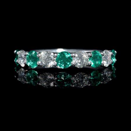 .73ct Diamond and Emerald 18k White Gold Ring