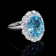 1.18ct Diamond and Blue Topaz 18k White Gold Ring