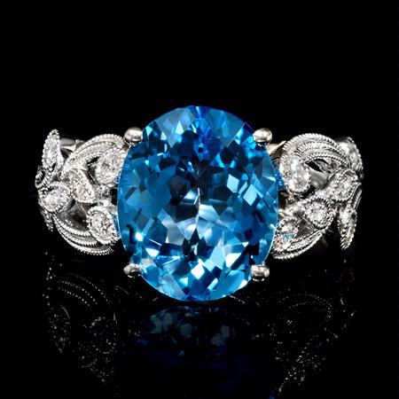 .31ct Diamond and Blue Topaz 18k White Gold Ring