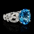 .31ct Diamond and Blue Topaz 18k White Gold Ring