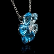 .09ct Diamond and Blue Topaz 18k White Gold Pendant
